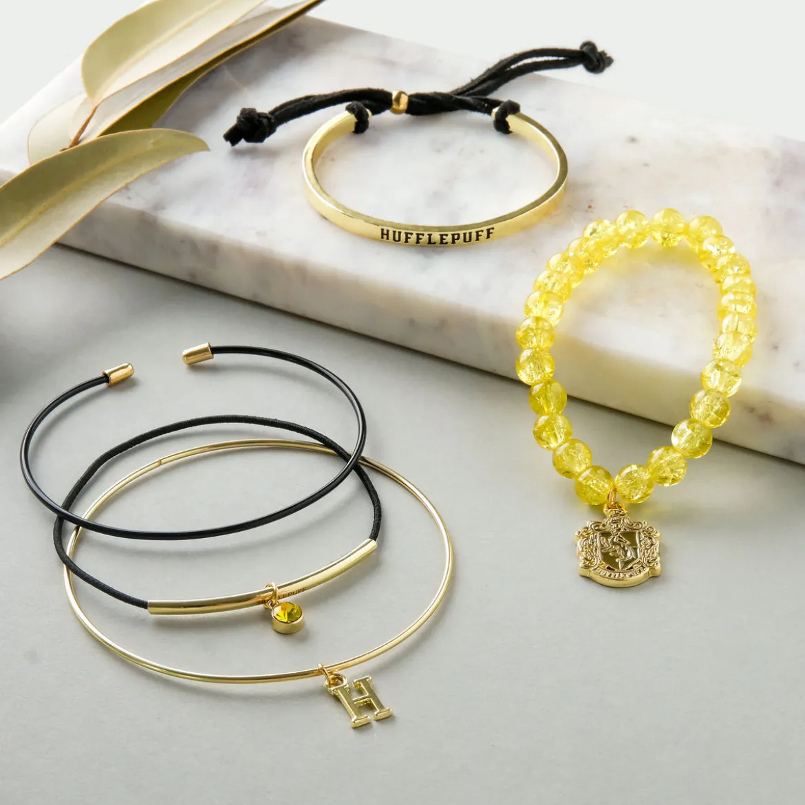 Harry Potter - Hufflepuff Armbänder 5er Set