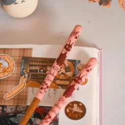 Kikis kleiner Lieferservice - Jiji Ess-Stäbchen pink