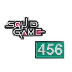 Squid Game Ansteck-Pins 2er-Pack Squid Game & Player 456